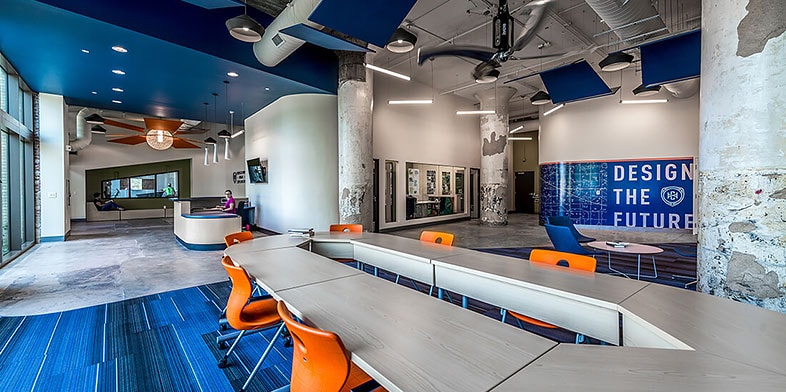 Office entrance with receptionist’s desk and conference table